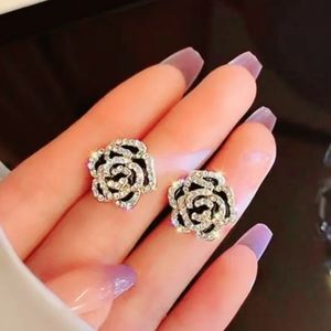 2/$20 Nwtib.Elegant Camilla Flower rhinestone stud set